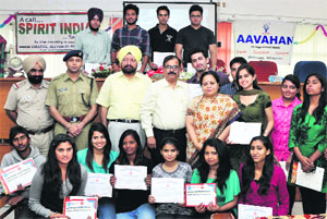 Students of SD College, Sector 32, pose for a photograph after receiving awards in community work, dramatics and other extra-curricular activities. 