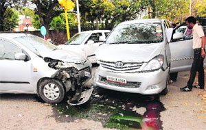 The cars that collided head-on on the road separating Sectors