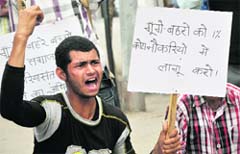 Members of the Association of parents of Hearing Handicapped protest in Jammu on Thursday. Tribune photo: Inderjeet Singh