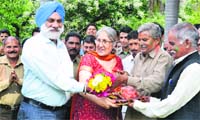Prof Mohan Paul Singh Ishar, Vice Chancellor of JU and Linda Ishar, his wife, celebrate Holi with university staff on the campus. Tribune photo: Anand Sharma 