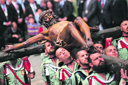 Members of the Spanish Legion carry a statue of the Christ of the Good Death during the Holy Week in Malaga on Thursday. 