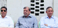 Trivendra Singh Panwar, president of the Uttarakhand Kranti Dal, addresses a press conference in Dehradun on Friday.