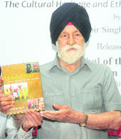 Marshal of the Air Force Arjan Singh releases a book titled Punjabiyat during a function in New Delhi on Friday.