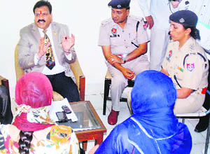 Rajkumar Verka, Vice-Chairman, National SC/ST Commission, meets victims of gender crime in Amritsar on Friday. 