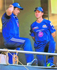 Mumbai Indians captain Ricky Ponting talks with team mentor Anil Kumble during a practice session in Mumbai on Friday. 