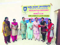 Faculty members of the Guru Kashi University pose for a photograph at the launch of its women club in Bathinda on Saturday. 