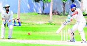 Players in action during a match between Mohit Warriors Cricket Club and Yuvi-XI Cricket Club at Sector 26 in Chandigarh on Saturday