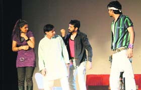 Aritstes enact the play Wohti and Wife at Bal Bhawan, Sector 23, in Chandigarh on Saturday