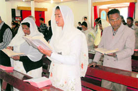 Devotees pray at the central methodist church in Mussoorie on the occasion of Good Friday.