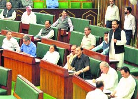 Opposition members raise questions during the budget session in the Legislative Assembly in Jammu on Saturday