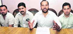 Rajveer Singh, state secretary, Jammu and Kashmir Pradesh Youth Congress addresses a press conference to launch a drive against milk adulteration in Jammu on Saturday. Tribune Photo: Inderjeet Singh