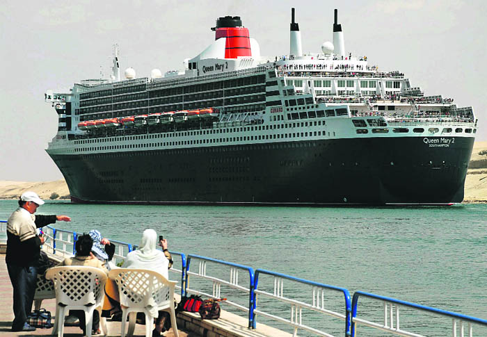 The ocean liner crosses the Suez Canal in Ismailia, some 75 miles north of Cairo.