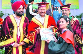 SR Ladhar (centre), Commissioner, Jalandhar, gives degree to a student at the 55th convocation of DAV College in Amritsar on Sunday