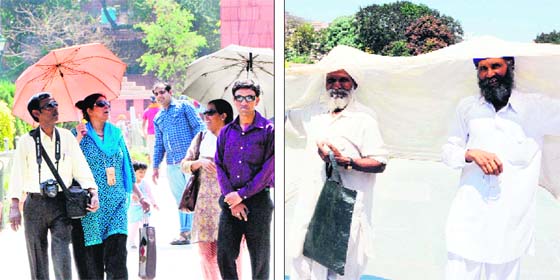 Mercury on the rise: With the rise in temperature, visitors to Jallianwala Bagh try to beat the heat on Sunday