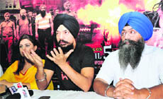 Director, actor and writer of the controversial Punjabi film, Sadda Haq, Kuljinder Sidhu (middle) speaks to the mediapersons in Bathinda on Sunday. Also seen in the picture are actress Himanshi Khurana and Amardeep Singh