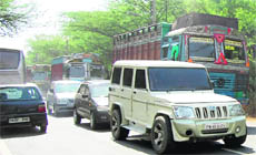 Vehicles moving at a snails pace on the Bibiwala road in Bathinda.