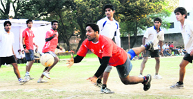 Players in action during a handball match at Government Model Senior Secondary School, Sector 19, in Chandigarh on Sunday.