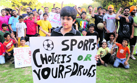 Children hold a protest against the conversion of a playground into a green belt in Sector 21, Chandigarh, on Sunday.