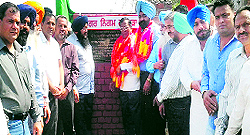 Chief Parliamentary Secretary Som Parkash along with Markfed Chairman Jarnail Singh Wahid lays the foundation stone of a parking lot in Phagwara on Sunday
