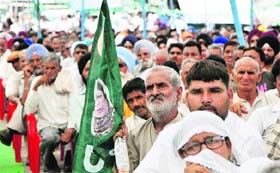 PDP workers attend a meeting at RS Pura on Sunday