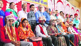 Couples whose marriages were solemnised at Gurdwara Khalsa Istri Dal Shaheedan, Domiria Pull, in Ludhiana on Sunday