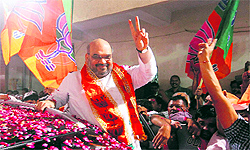 Former Gujarat Home Minister Amit Shah with his supporters after being named general secretary of the BJP in Ahmedabad on Sunday