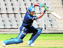 Mumbai Indians Ricky Ponting plays his trademark cover drive during a warm-up game on Sunday