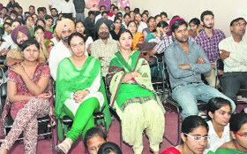 Participants attend a seminar at Malwa College in Bathinda on Monday.