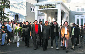 PK Dhumal, Leader of the Opposition, and other MLAs walk out of the Vidhan Sabha in Shimla on Monday