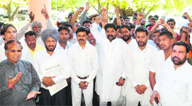 MC sanitation workers stage a protest at the Mini-Secretariat in Ludhiana on Monday.