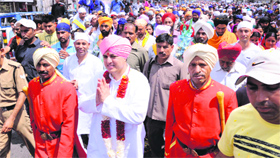 Mahant Devender Dass, Mahant of Sri Guru Ram Rai darbar, leading a nagar parikarma during the historic Jhanda Mela in Dehradun on Tuesday.