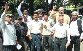 Workers of Uttarakhand Parivartan Party holding a demonstration in support of their demands at the office of the District Magistrate in Dehradun on Tuesday. 