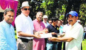 Dr VK Bahuguna, DG, ICFRE, presents awards to the winners of the cricket tournament at FRI, Dehradun, on Tuesday.
