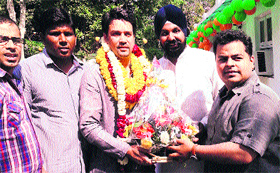 Bharatiya Janata Yuva Morcha national president Anurag Thakur is greeted in New Delhi