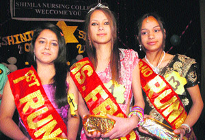 Archana Negi, Shimla Nursing College (centre), with the first and second runners-up Priyanka (left) and Navneeta at Kalibari hall in Shimla.