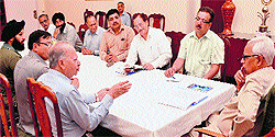 Governor NN Vohra with members of the All Jammu Hotels and Lodges Association at Raj Bhawan in Jammu on Tuesday