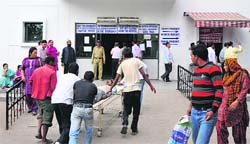It was business as usual as junior doctors suspended their strike for 72 hours at GMC in Jammu on Tuesday. Tribune photo: Inderjeet Singh