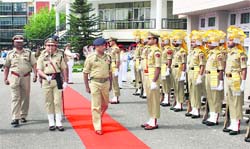 SM Sahai inspects the guard of honour after taking over as the ADGP Armed in Jammu on Tuesday. A Tribune photograph