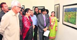 Governor NN Vohra and his wife Usha Vohra at an exhibition at Kala Kendra in Jammu on Tuesday. Tribune photo: Anand Sharm