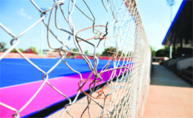 The broken net of a goalpost