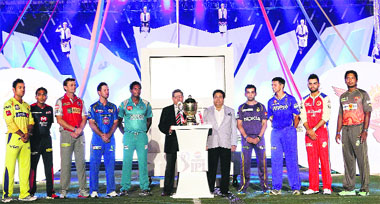 All nine captains of Indian Premier Leagues Season Six pose with the trophy during the opening ceremony in Kolkata on Tuesday