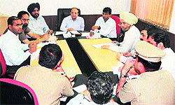 MC and police officials at a meeting to discuss traffic problems in Amritsar on Wednesday