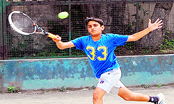A player in action during the AITA Talent Series Tennis Tournament at Maharaja Ranjit Singh Tennis Stadium, Amritsar, on Wednesday