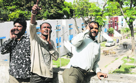 Former langur handlers shoo away monkeys by producing langurs calls in Chandigarh.