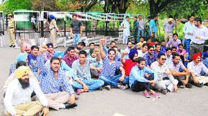 Members of the PUSU stage a protest outside the Vice-Chancellors office at Panjab University on Wednesday.