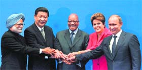 BRICS leaders (From L) Dr Manmohan Singh, President Xi Jinping of China, South Africa's President Jacob Zuma, Brazil's President Dilma Rousseff and Russian President Vladimir Putin