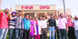 Paramedical staff of the Punjab Institute of Medical Sciences protest against the non-payment of salaries by the management in Jalandhar on Wednesday. Tribune photo: Malkiat Singh