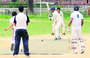 Players in action during the Inter-Department Cricket Tournament at the University of Jammu on Wednesday.