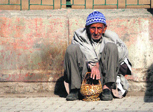 An elderly man sitting with a kangri in Srinagar on Wednesday.