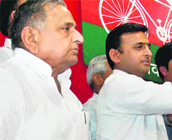 Samajwadi Party supremo Mulayam Singh Yadav and UP Chief Minister Akhilesh Yadav at a party meeting in Lucknow on Wednesday.